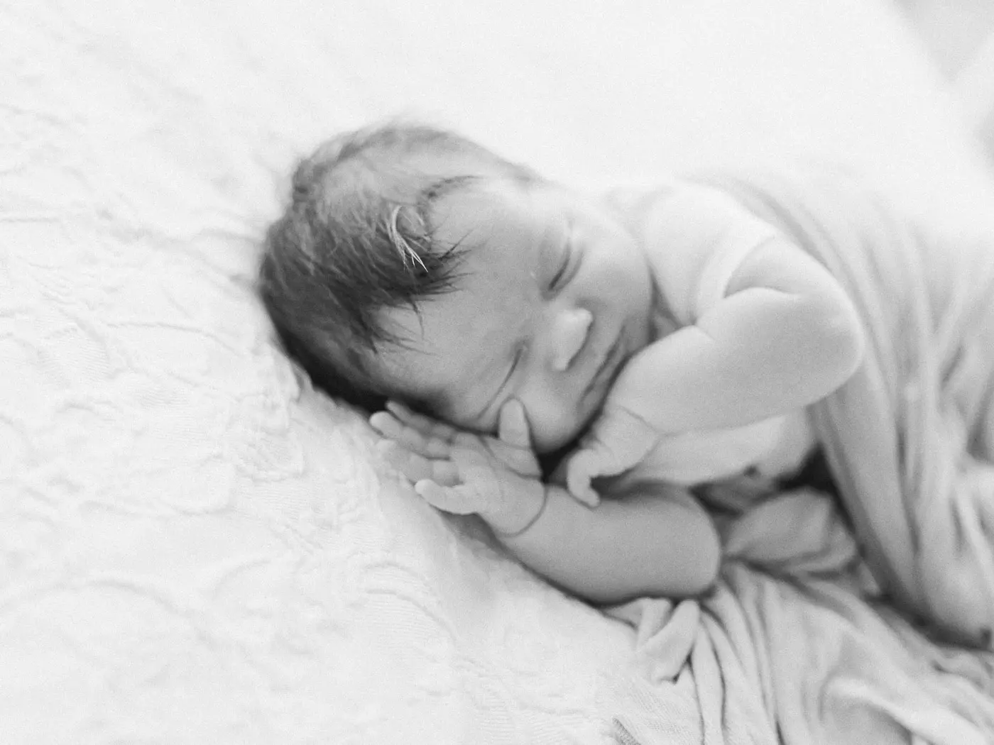 Black and white portrait of newborn baby boy