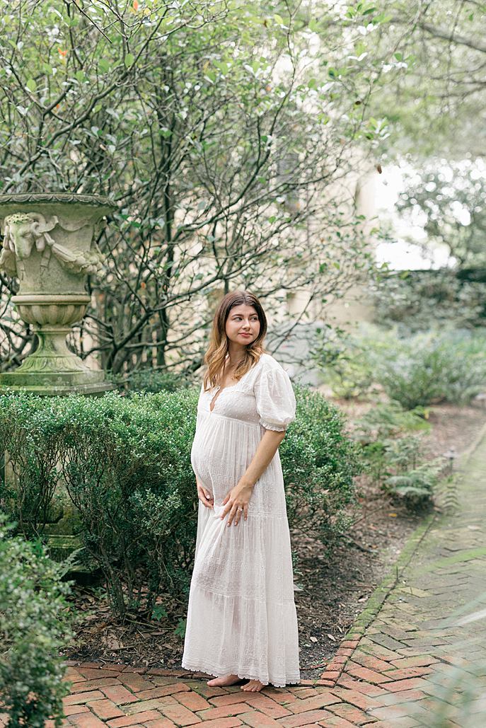 Maternity session in doen gown at Savannah's Ship of the Sea Gardens